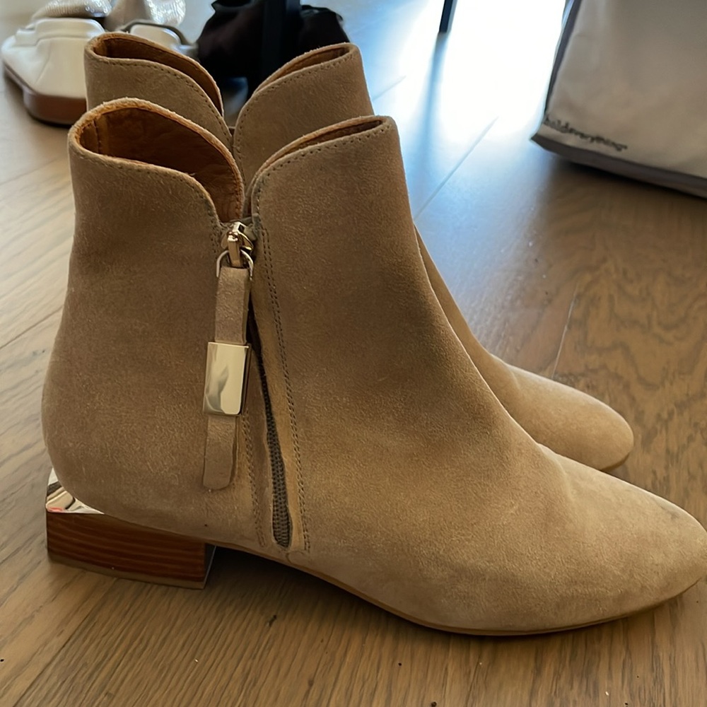 See By Chloe ankle boots with gold accents
